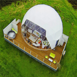 Geodesic dome structure on a grassy field